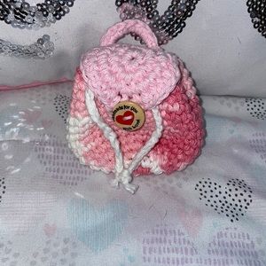 Tiny crochet keychain/pods holder .